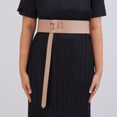 Model in blue co-ord set with pleated trousers, relaxed fit